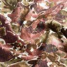 Tonic Living Marbella Rose multi-use floral fabric featuring large-scale blooms in warm burgundy and dusty rose.