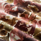 Tonic Living Marbella Fabric in Rose, a painterly floral upholstery and drapery fabric in burgundy and soft pink.
