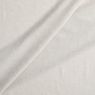 Tonic Living Monaco Sheer Fabric in Fog, a lightweight neutral sheer fabric for curtains and window treatments.