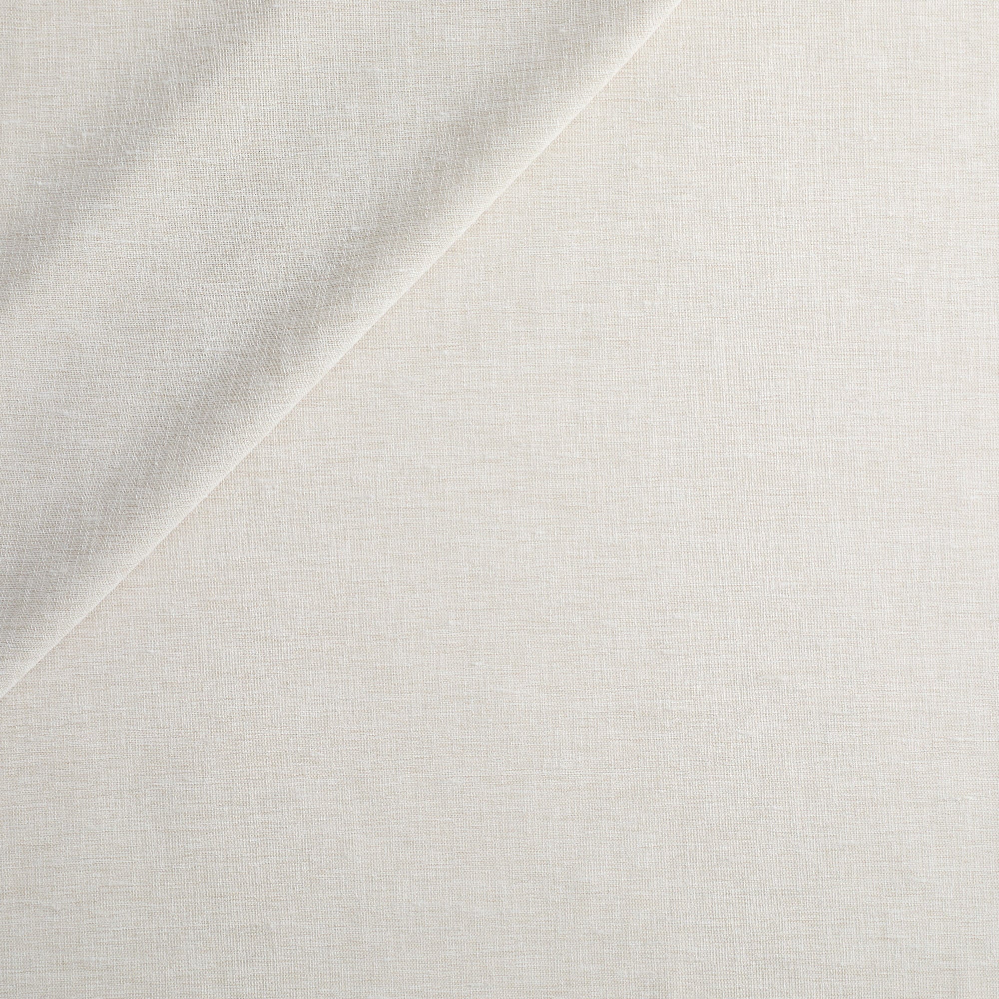 Tonic Living Monaco Sheer Fog drapery fabric featuring a soft beige colour and subtle horizontal slub texture.