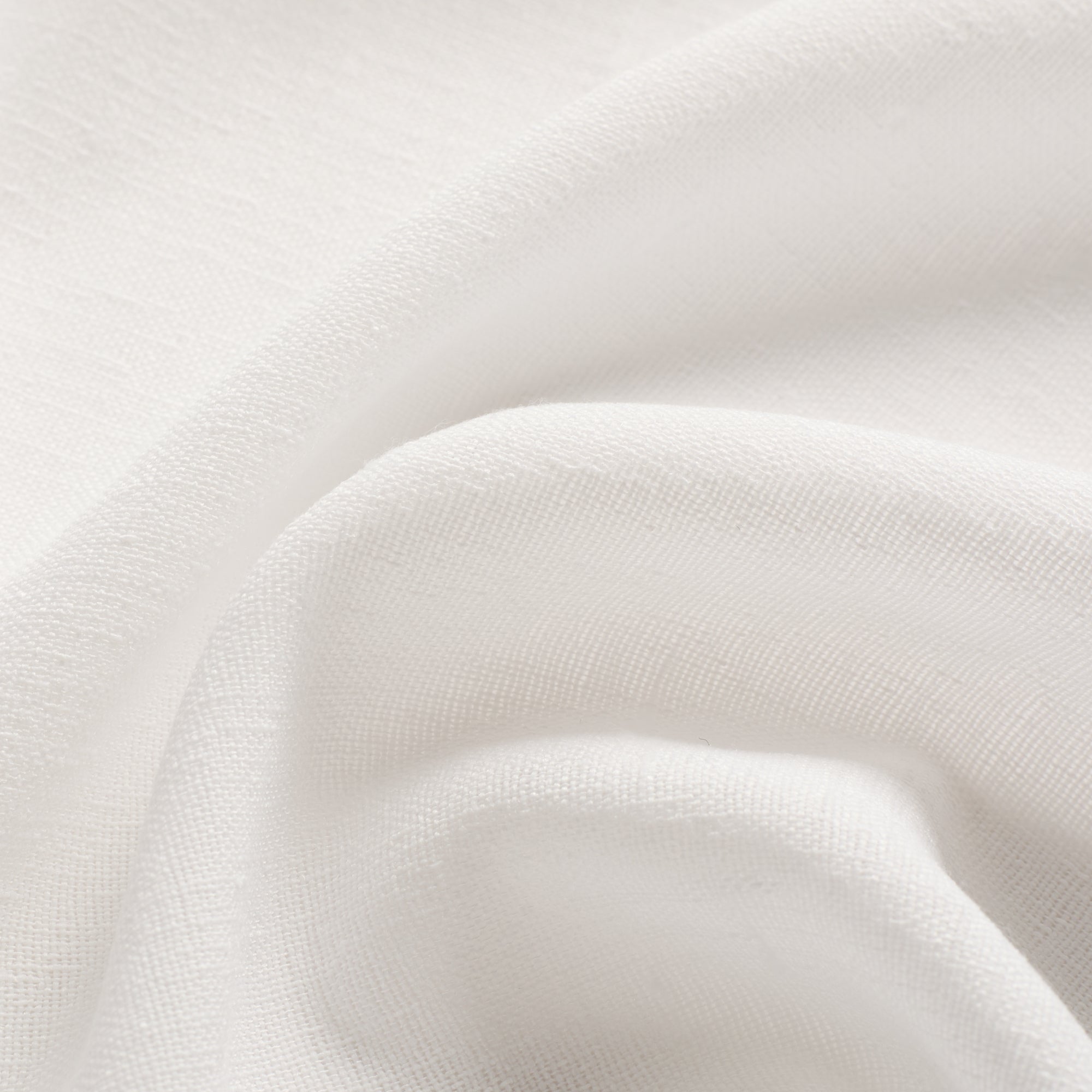 Tonic Living Monaco Sheer Salt drapery fabric featuring a crisp white colour and subtle horizontal slub texture.