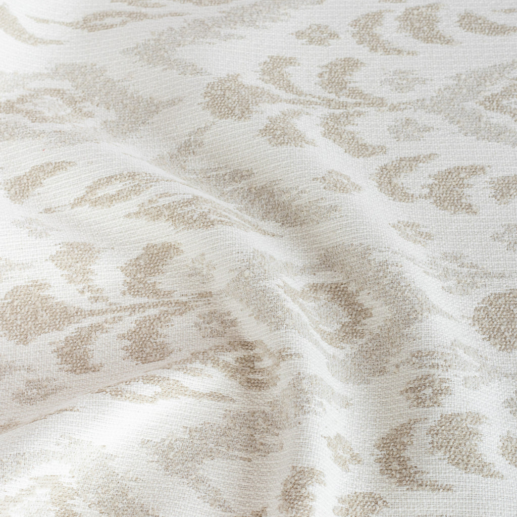 Monterey Sand, a cream white and taupe oversized ikat patterned indoor outdoor fabric from Tonic Living