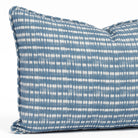 Close-up of a 14x20 blue and white lumbar pillow with a dotted stripe pattern and piping detail (Nile Indigo by Tonic Living).