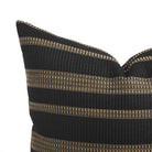 Close up of Tonic Living Odessa Stripe outdoor cushion showing black and tan vertical stripes with textured bands.