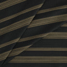Tonic Living Odessa InsideOut Carbon indoor/outdoor upholstery fabric with a striking striped design in neutral tones.