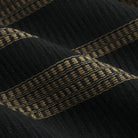 Close up of Tonic Living Odessa InsideOut Carbon fabric showing its black and tan vertical stripe detail.