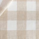 a white and beige buffalo check patterned home decor fabric from Tonic Living 