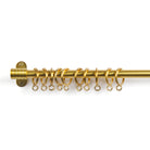 Tonic Living Gold outside mount bracket with café curtain rod and curtain rings.
