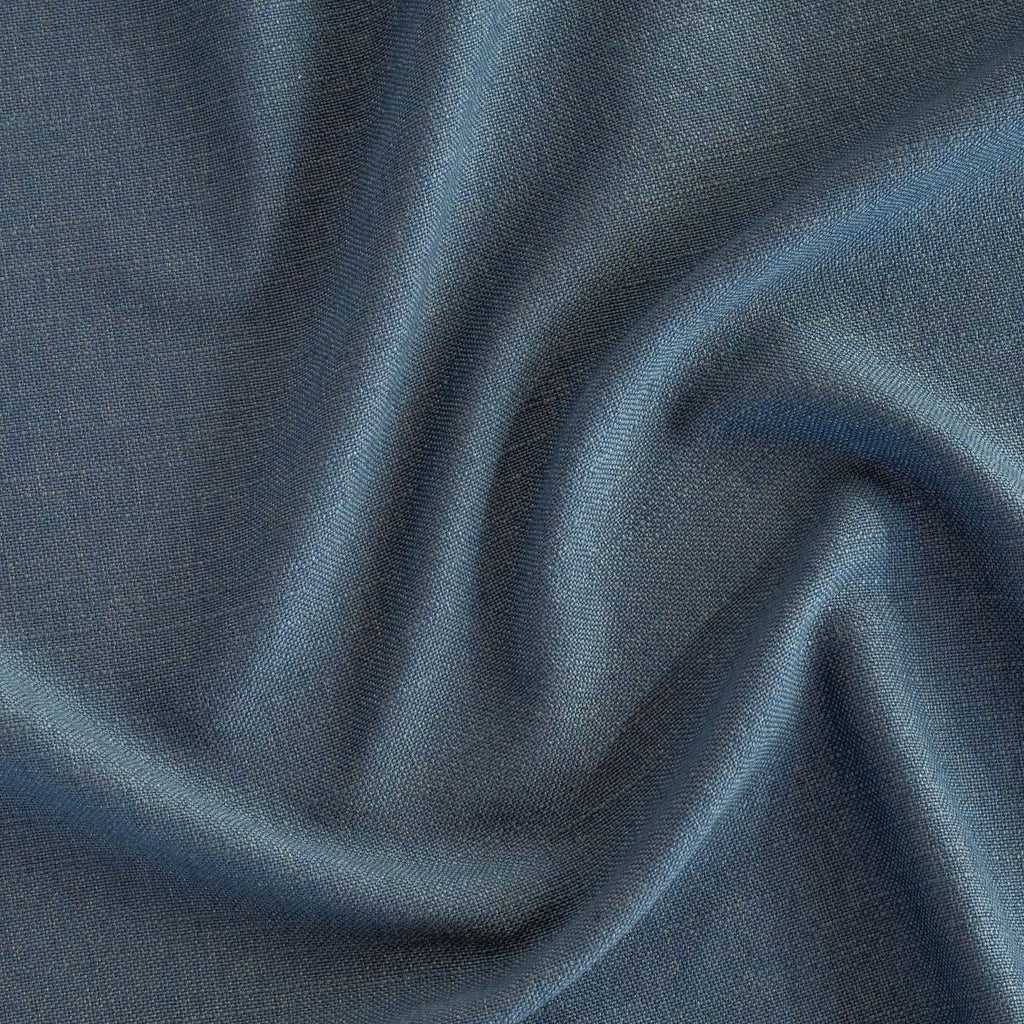 a solid blue linen blend upholstery fabric from Tonic Living