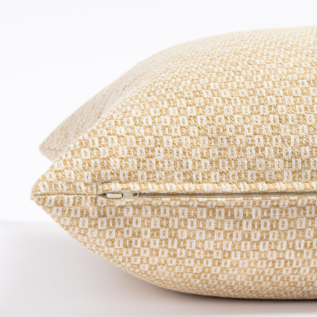 a yellow gold and cream small check patterned throw pillow : close up zipper view