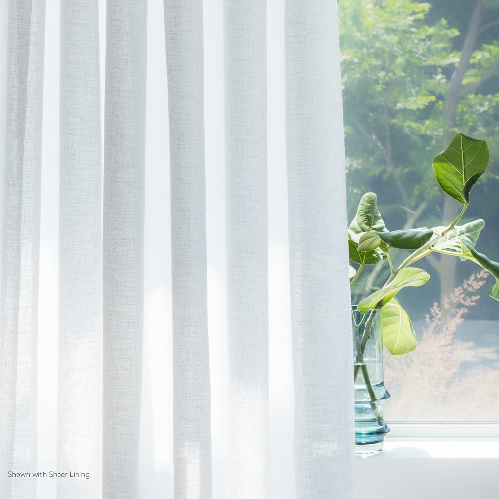 a soft white sheer drapery fabric from Tonic Living : shown with sheer lining
