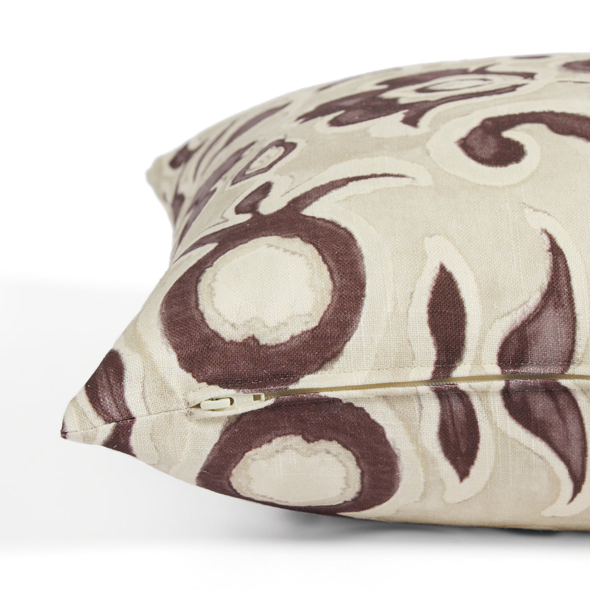 Side zipper detail of Tonic Living Paloma 20x20 decorative cushion featuring a muted purple and oatmeal floral pattern.