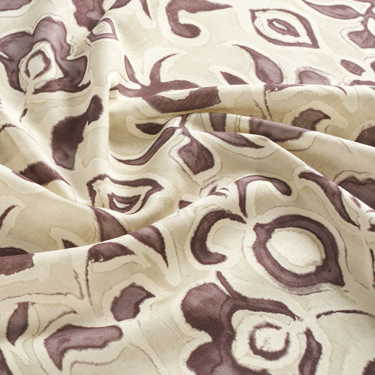 Tonic Living Paloma Fabric in Mauve, a smoky plum and oatmeal floral curtain fabric with a large-scale painterly botanical design.