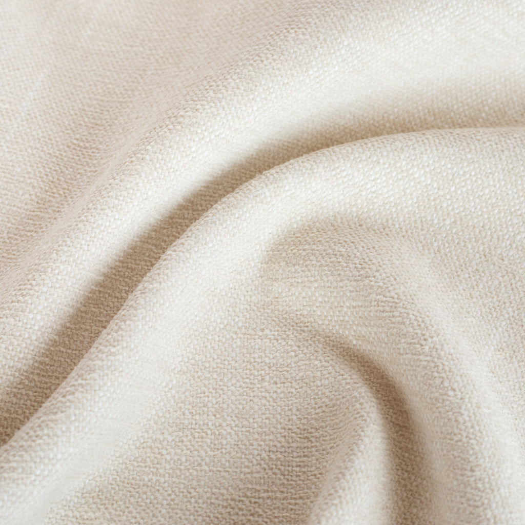 a soft cream outdoor Tonic Living upholstery fabric : close up view