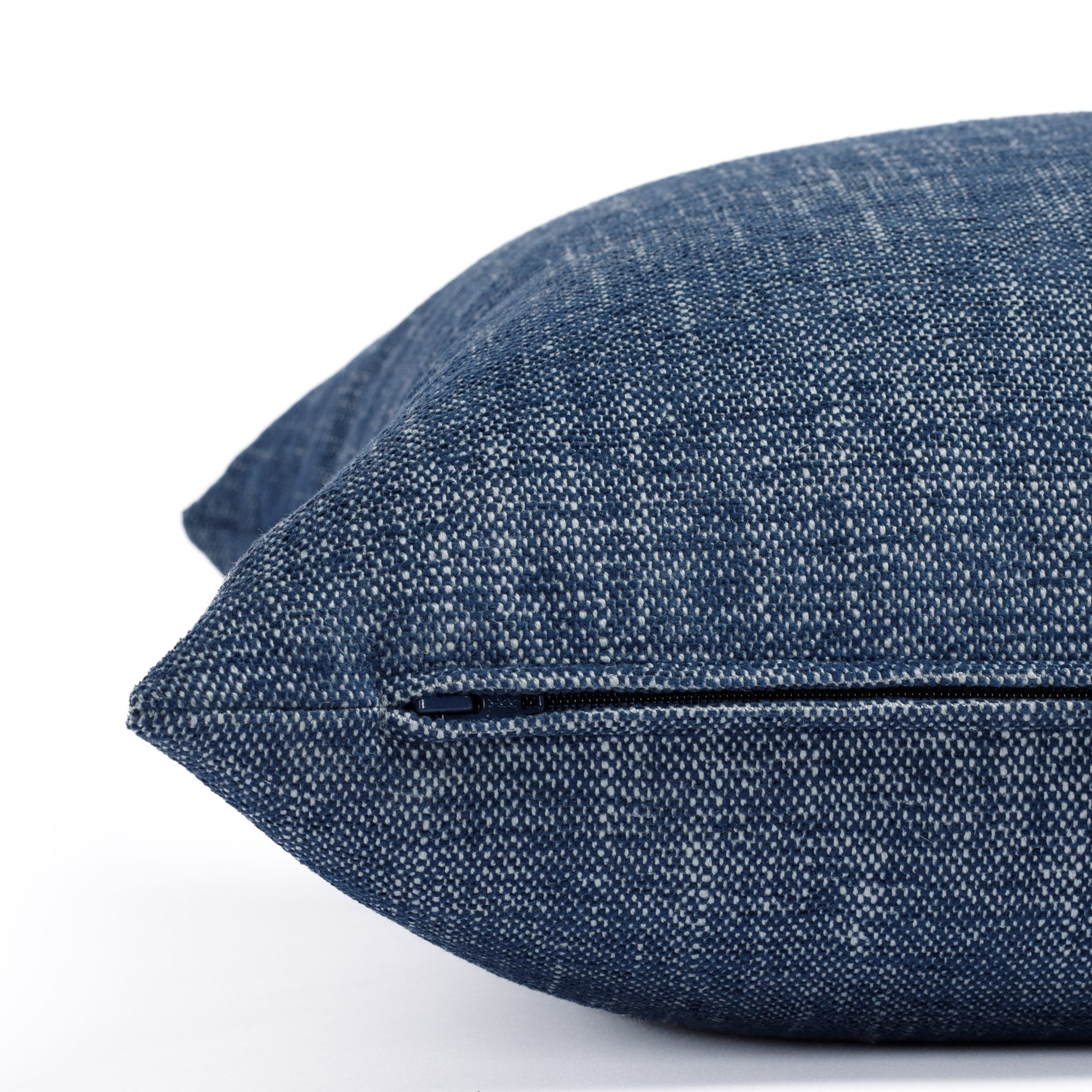 an indigo blue outdoor : close up zipper detail