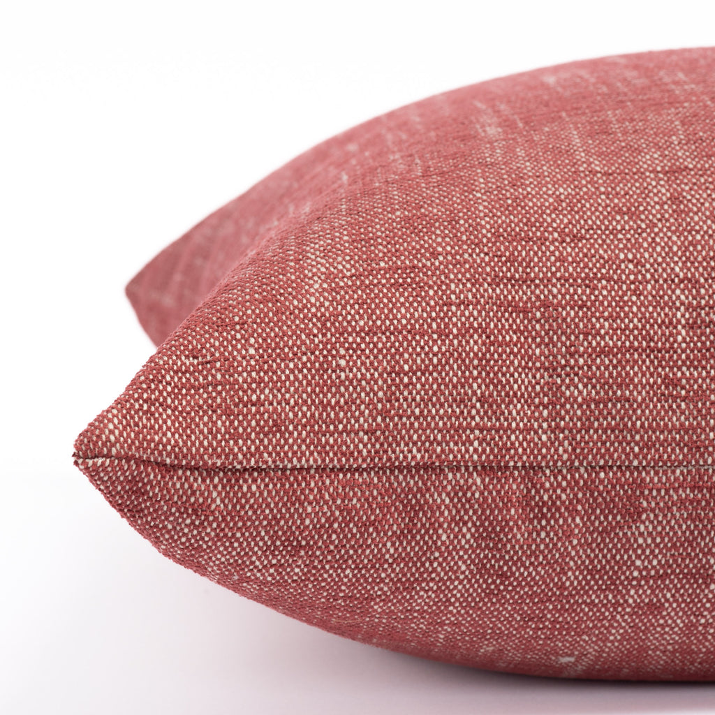 a ruby red chenille textured outdoor pillow : close up side view