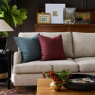 Living room with Pembrook Merlot red and  Bedford Denim blue pillows styled on a sofa – Tonic Living