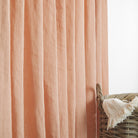 Tonic Living Pietra Salmon Pink curtain fabric shown as linen drapery in a soft salmon colour.