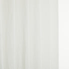 Close up of Tonic Living Positano Linen Shower Curtain showing soft ivory linen texture and subtle slub detail.