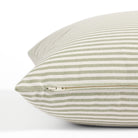 Side zipper detail of Tonic Living Refresh 20x20 outdoor toss pillow in green and white stripe.