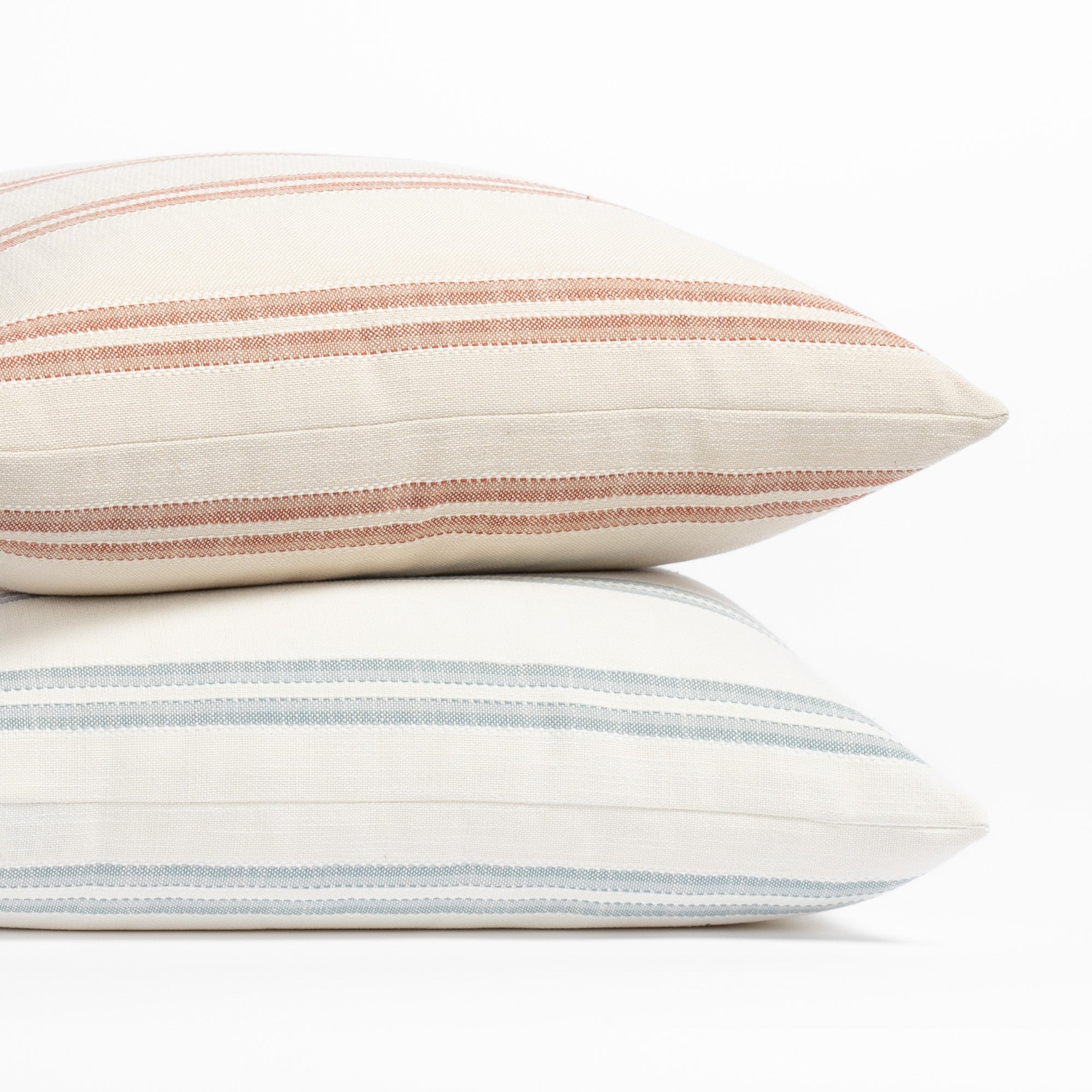 modern stripe patterned Tonic Living throw pillows : Riviera Stripe Clay and Riviera Stripe Mist