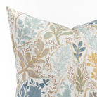 a multicoloured floral garden print throw pillow : close up view