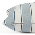 Side zipper detail of Tonic Living Sentiment 20x20 outdoor toss pillow in blue stripe.