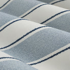 Close up of Tonic Living Sentiment Sunbrella Denim fabric showing white, denim blue, and navy stripe detail.