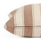 Side zipper detail of Tonic Living Sentiment 20x20 outdoor toss pillow in terracotta stripe.