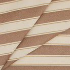 Tonic Living Sentiment Sunbrella Terracotta indoor/outdoor upholstery fabric featuring a wide stripe with wheat and beige tones.