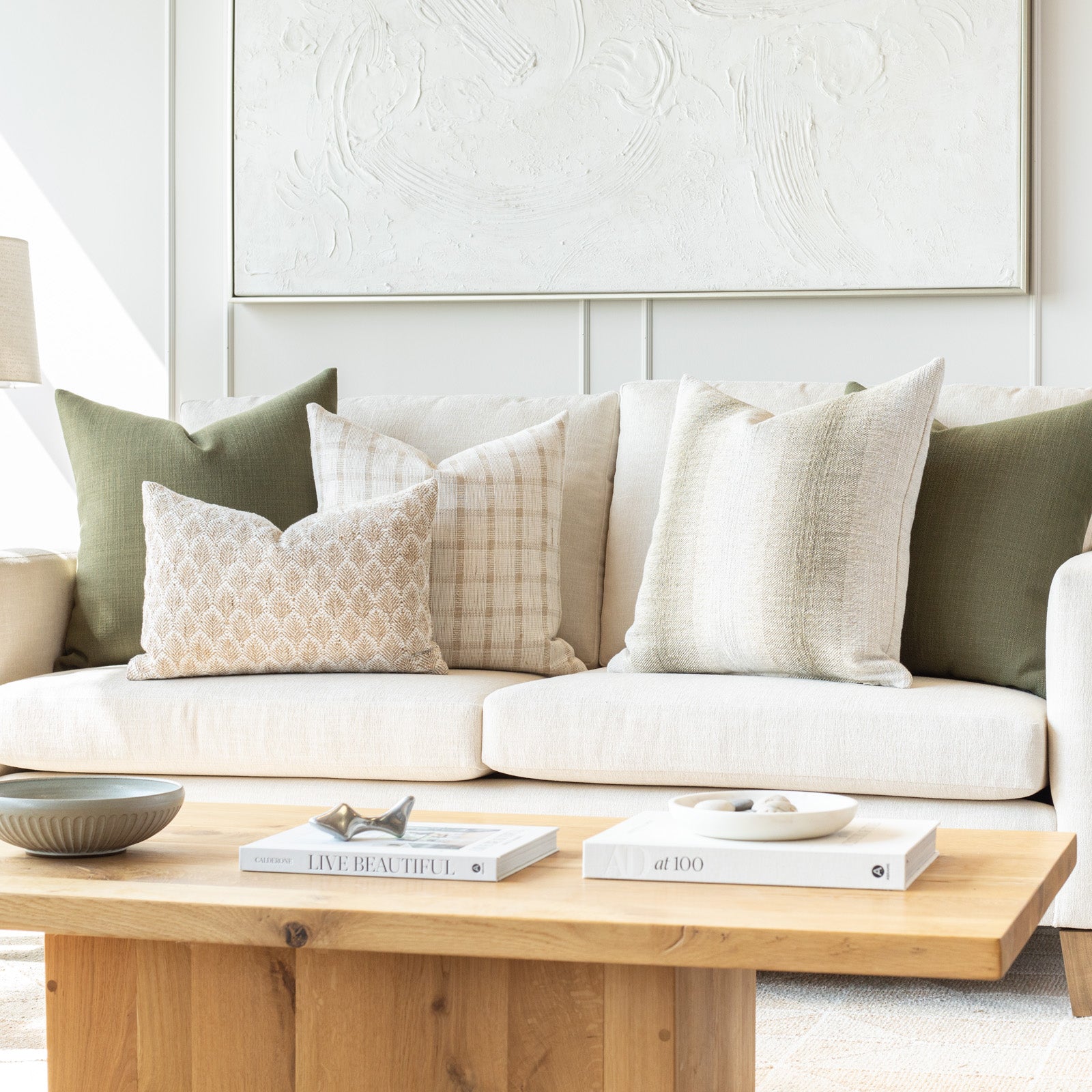  Neutral and Moss Sofa Pillow Pairing: a combination of cream, flax and mossy green pillows