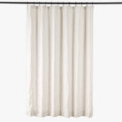 Tonic Living Siena Stripe Linen Shower Curtain in Buff, a warm ivory and beige shower curtain with soft vertical stripe.