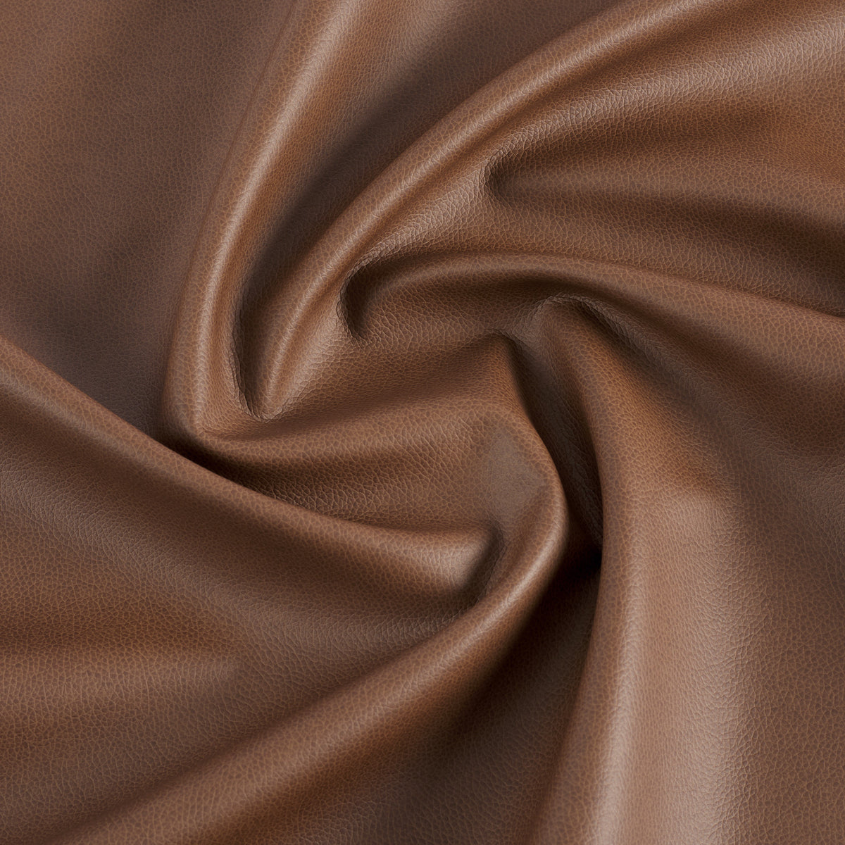 Tonic Living Smythe Cognac high-performance faux leather fabric featuring a rich brown colour and natural-looking grain.