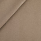 Tonic Living Smythe Faux Leather Fabric in Portobello, a taupe brown performance upholstery fabric with the rich character of genuine leather.