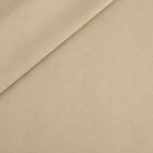 Tonic Living Smythe Faux Leather Fabric in Sandstone, a beige performance upholstery fabric with the rich character of genuine leather