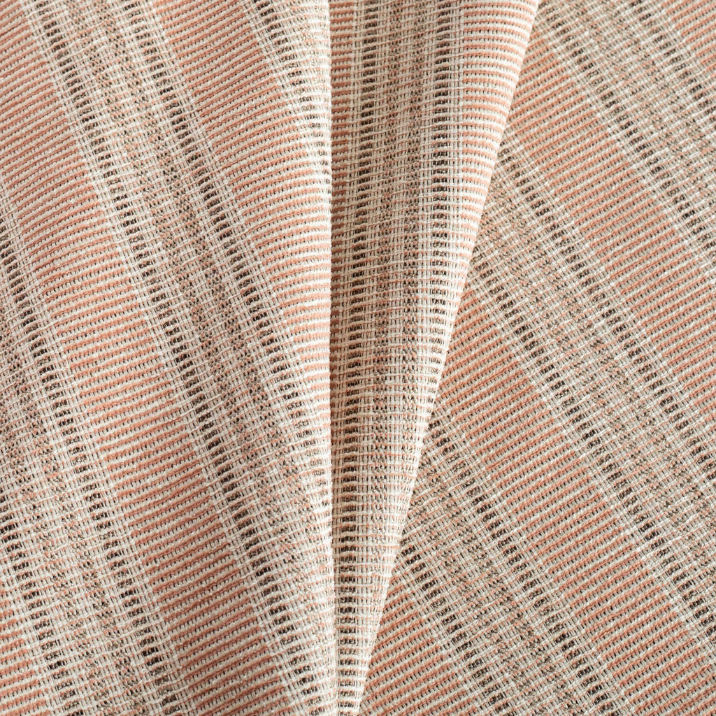 an earthy terracotta pink, brown and sand striped Tonic Living Inside Out fabric