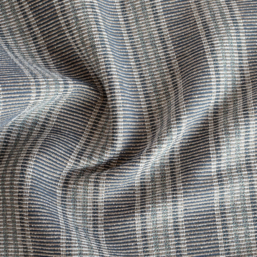 an indigo, aqua and sandy beige striped outdoor upholstery fabric