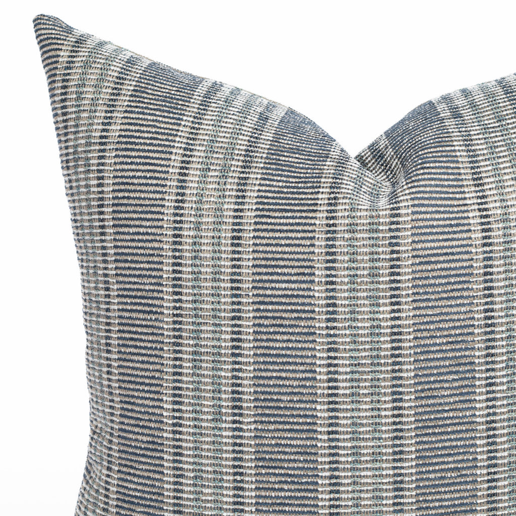 an indigo blue, aqua and white stripe outdoor pillow : close up view