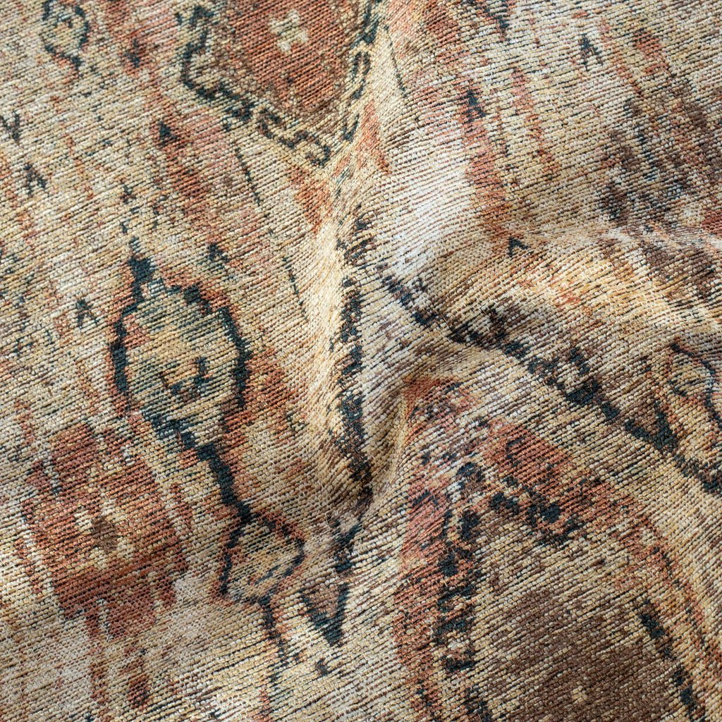 Souk Fabric Rust, a sand, rosewood, chestnut and rust vintage tapestry patterned upholstery fabric from Tonic Living