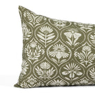 Close up of Tonic Living Stella Evergreen extra large lumbar pillow showing dark green and beige floral medallion detail.