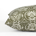 Side zipper detail of Tonic Living Stella 16x42 bolster pillow in dark olive green and natural floral print.