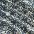 Tonic Living Stella Harbour Blue drapery fabric shown with movement highlighting blue and natural medallion pattern.