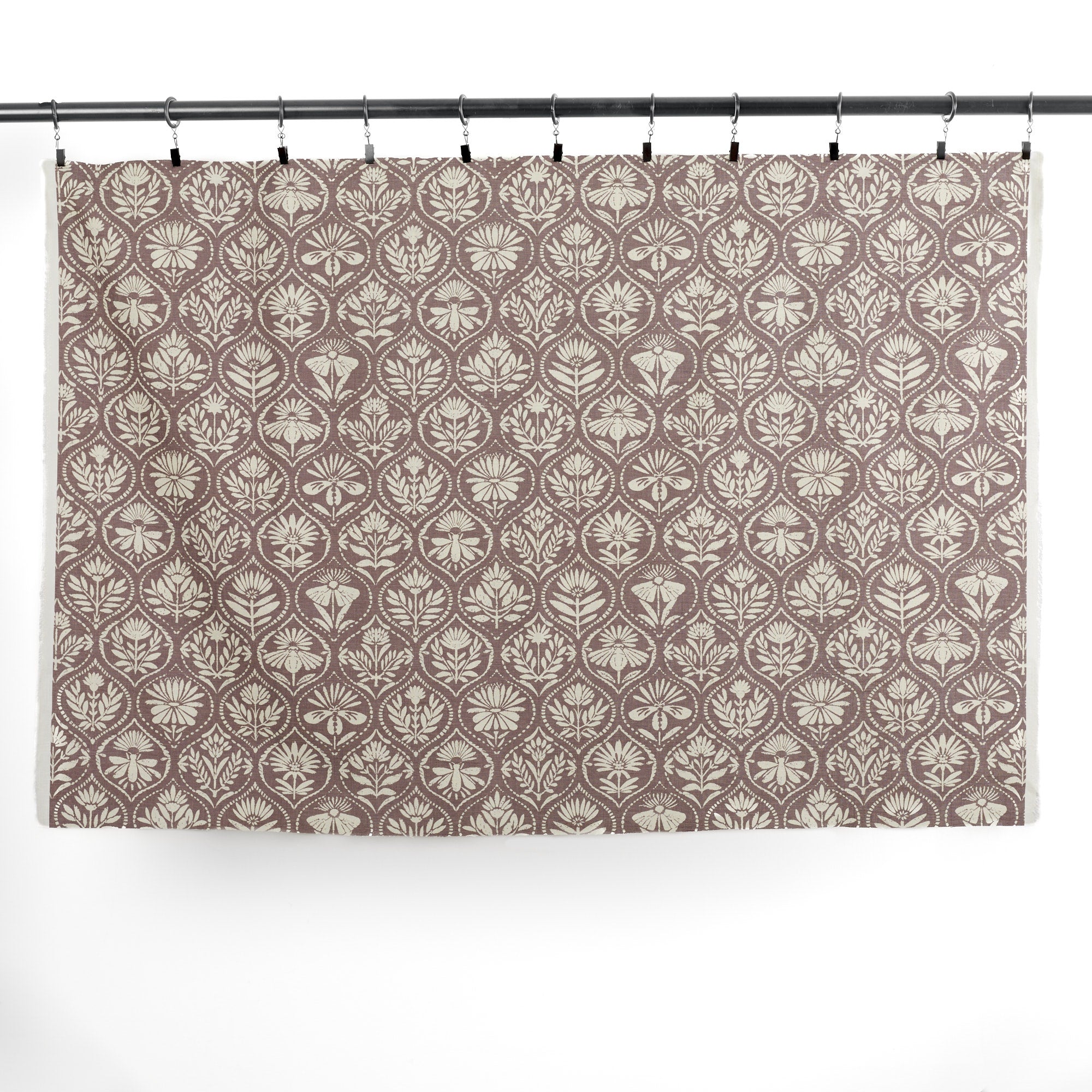 Full yard of Tonic Living Stella Mauve drapery fabric showing earthy purple and beige medallion pattern.