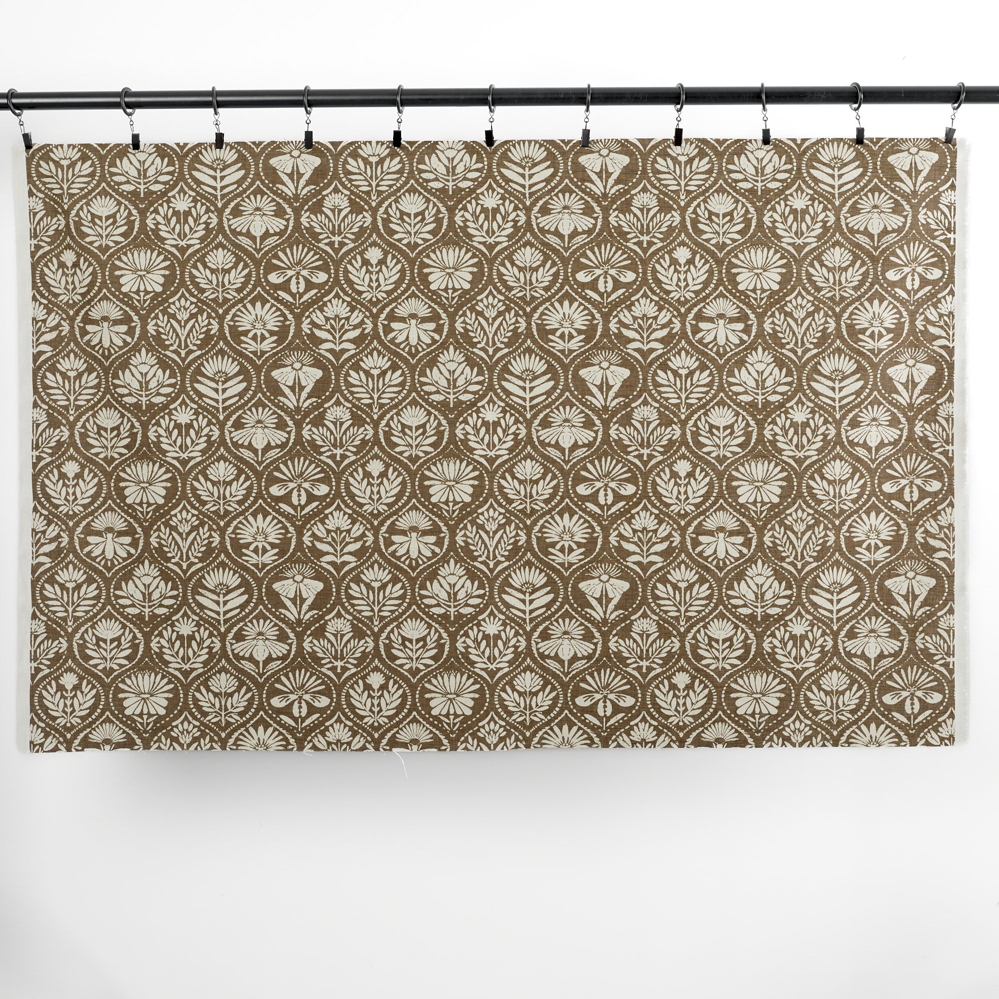 Full yard of Tonic Living Stella Mocha drapery fabric showing brown and beige medallion pattern.