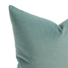 Close up of Tonic Living Sterling Velvet Lake pillow showing soft turquoise velvet with fine linear texture and luminous sheen.