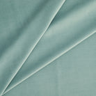 Tonic Living Sterling Velvet Lake upholstery fabric featuring a soft turquoise and robin’s egg blue velvet with subtle linear texture.
