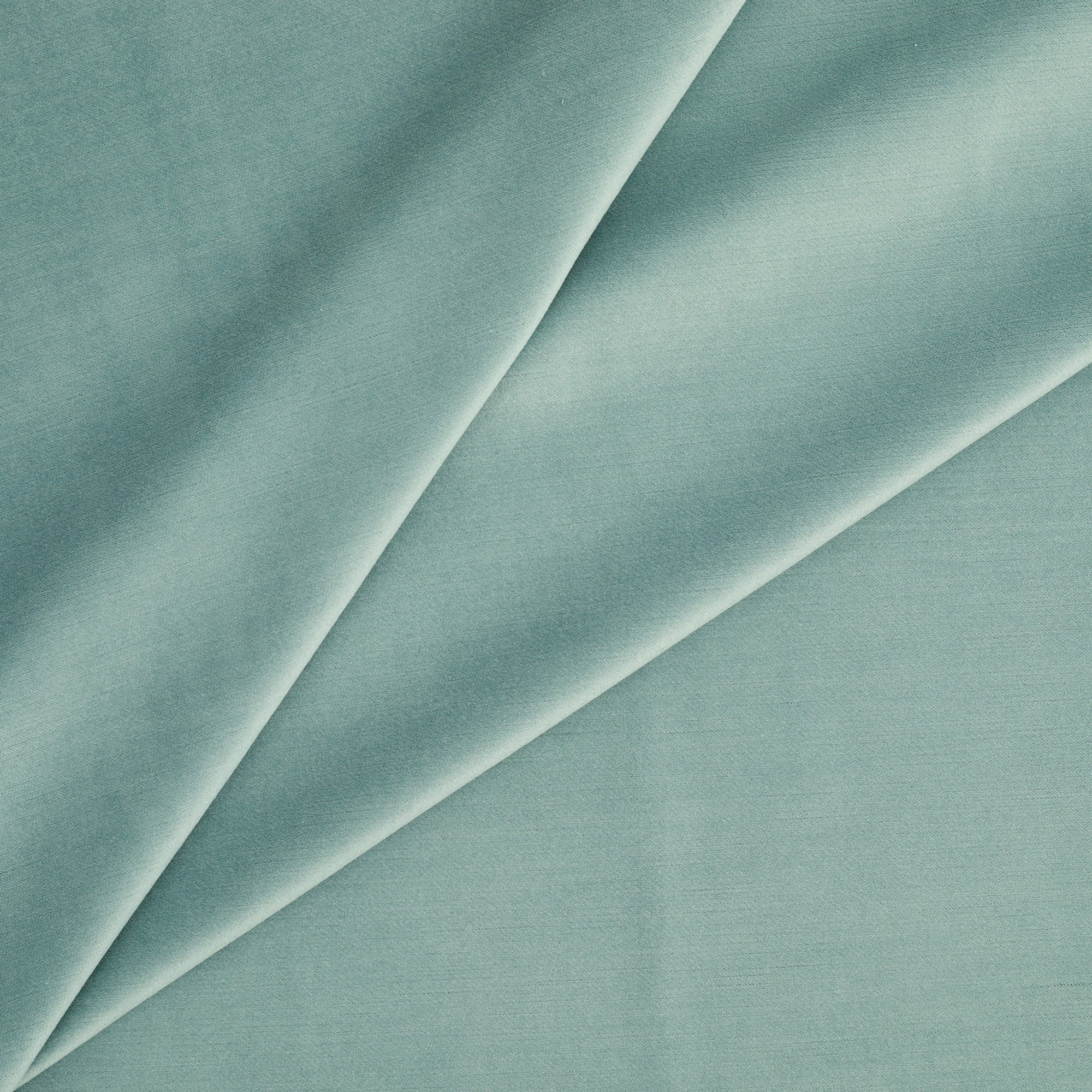 Tonic Living Sterling Velvet Lake upholstery fabric featuring a soft turquoise and robin’s egg blue velvet with subtle linear texture.