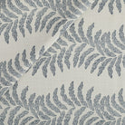 Tonic Living Swoon Sunbrella Outdoor Fabric in Denim, a blue and white indoor/outdoor upholstery fabric with a botanical stripe.