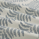 Tonic Living Swoon Sunbrella Denim indoor/outdoor upholstery fabric with an organic fern stripe design.
