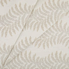Tonic Living Swoon Sunbrella Sand indoor/outdoor upholstery fabric featuring a subtle botanical stripe in neutral tones.